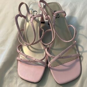 C.B. Collections sandals.